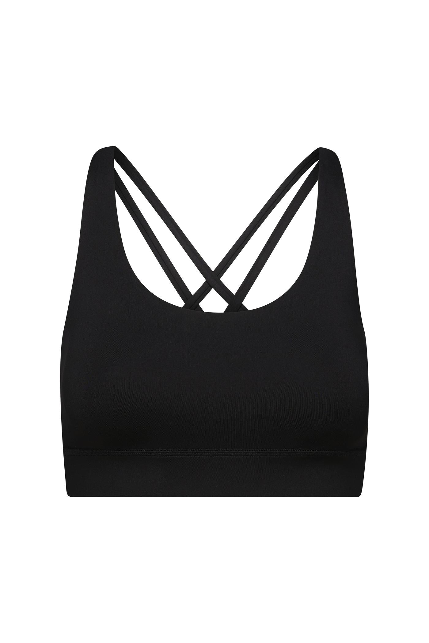 Hey Honey black sports bra with criss-cross back straps and a wide elastic band.